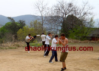 Students training Chinese kickboxing on song mountain of Shaolin temple