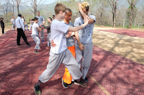 The Master teaching the Shaolin applications performance.