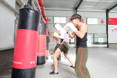 Chinese students training Chinese kickboxing.